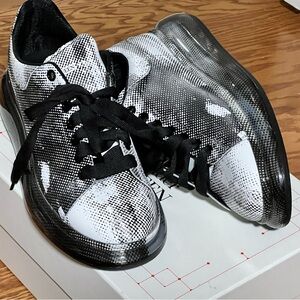 Alexander McQueen. Practically new.. ship in original box. Size 11 men’s
